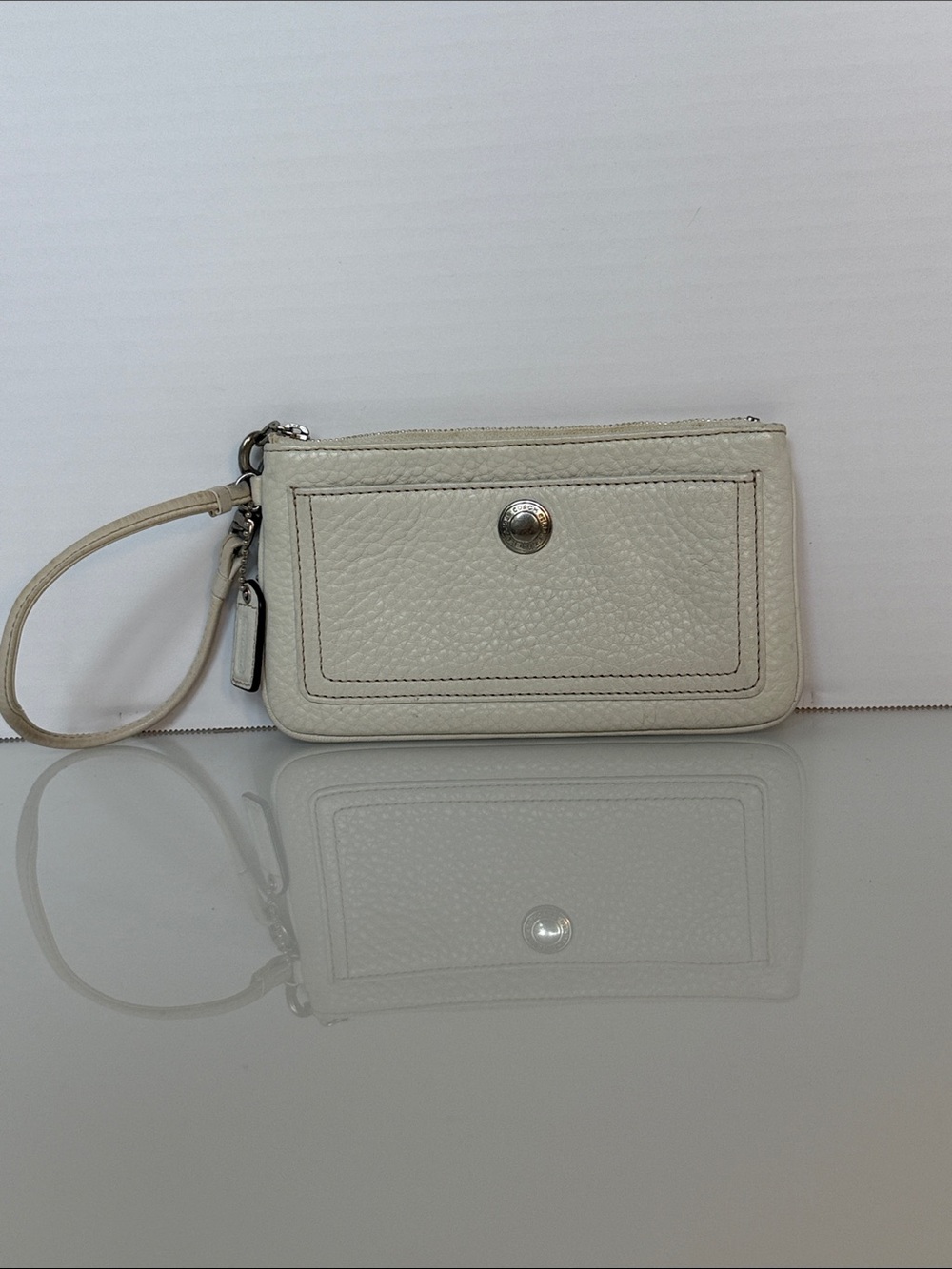Coach Pebbled Leather Wristlet in Cream